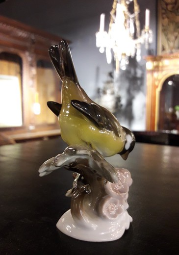 antique sculpture of titmouse bird