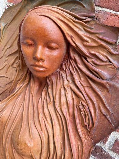 Antique sculpture representing a woman
