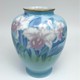 Vintage vase with lilies