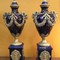 Antique paired vases with covers