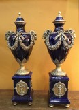 Antique paired vases with covers