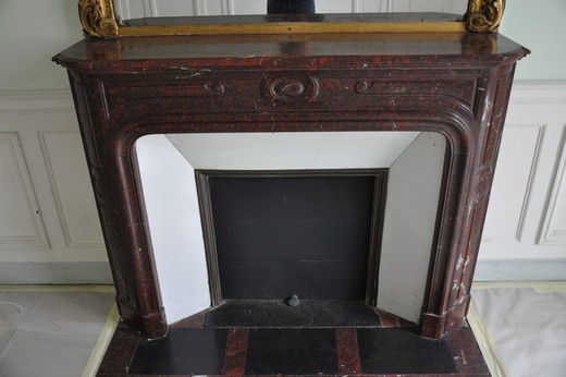 Antique Louis XIV rouge griotte fireplace