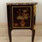 Antique chest of drawers in the style of Louis XVI