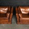 Leather armchairs in english style