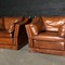 Leather armchairs in english style