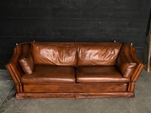 Leather sofa in english style