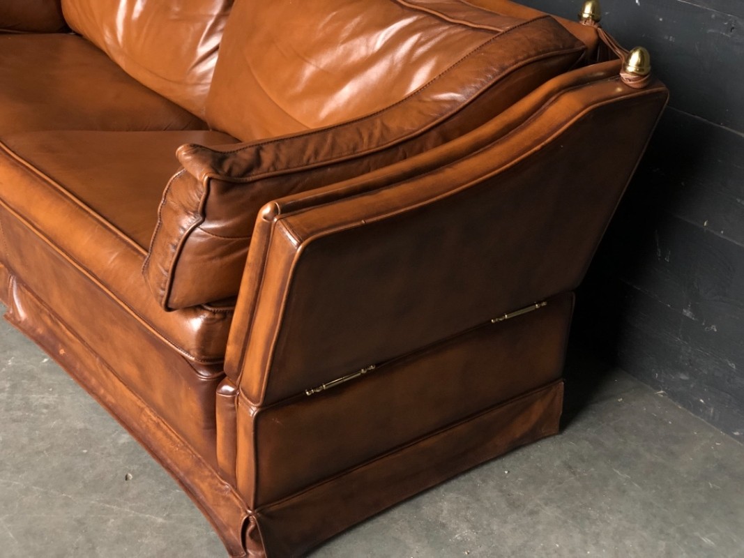 Leather sofa in english style