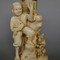 Okimono In Ivory. Group Of Men And Fox