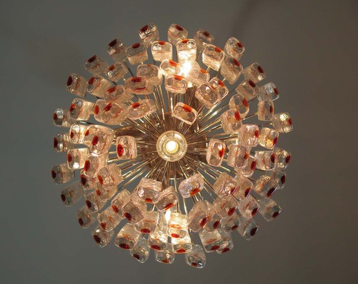 Fantastic vintage Murano chandelier made by 84 Murano crystal prism in a nickel metal frame. The glasses are transparent with ice effect and a small amber spot that enhances its beauty.