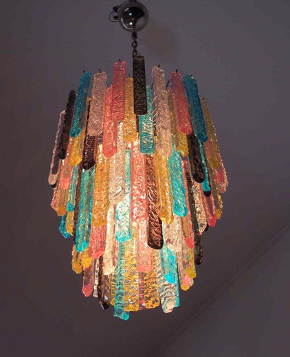 Fantastic vintage Murano chandelier made by 84 Murano crystal multicolored prism in a nickel metal frame.