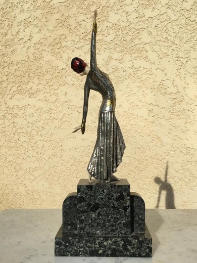Antique sculpture of a woman dancer