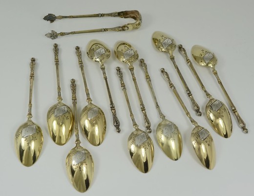 Antique set of 12 teaspoons and sugar tongs