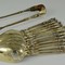 Antique set of 12 teaspoons and sugar tongs