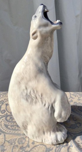 Antique porcelain sculpture of a white bear