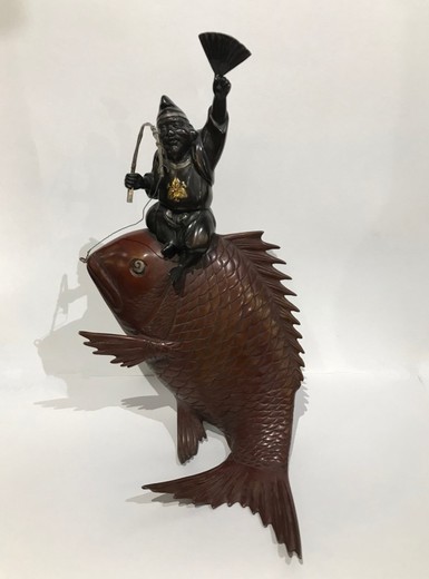 Antique sculpture "God Ebisu on fish"
