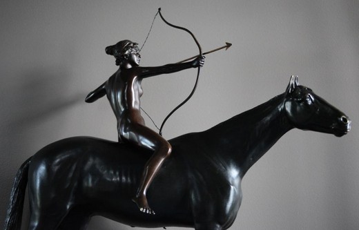 Antique sculptural composition "Amazon on horseback." Made of patinated bronze. The base is a stone. The work of the famous German sculptor - Helmut Shivelkamp. Germany, XX century.