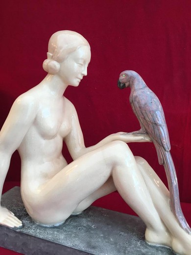 Sculpture "Girl with a Parrot". Faience. The work of the famous French sculptor - Georg Chauvel. France, 1930's.