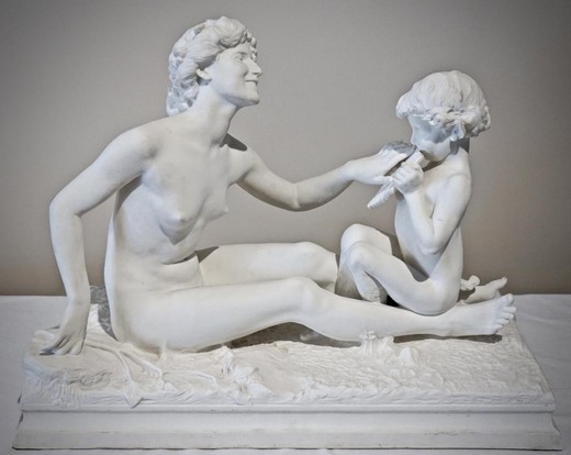 Antique sculpture "Little Bacchus with a Nymph". Biscuit. The work of the famous French sculptor - Jean Camus. France, the 20th century.