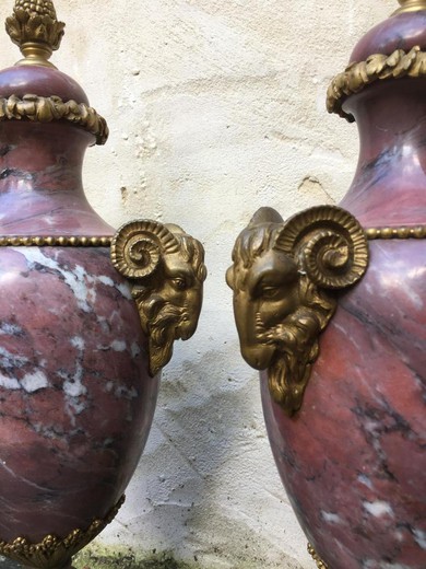 Antique pair vases in the Empire style. are made of marble and bronze. France, XIX century.