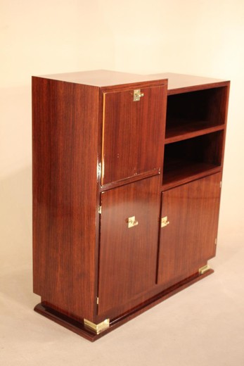 An antique secretar in the style of Art Deco. It is made of rosewood. France, 1930's.