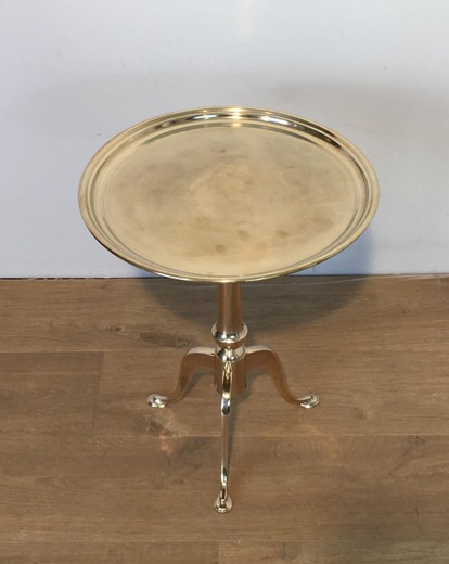 Antique table. It is made of brass. France, the 20th century.