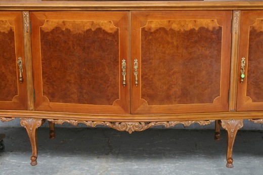 An antiquarian dresser in the style of Louis XV. Made of walnut. France, the 20th century.