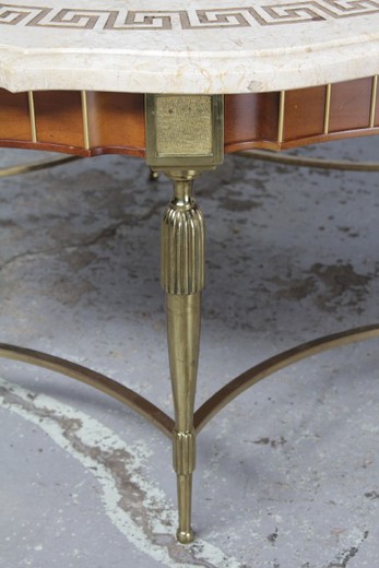 Antique coffee table in the style of Louis XVI. It is made of brass and walnut. The table top is marble. France, 1930's.