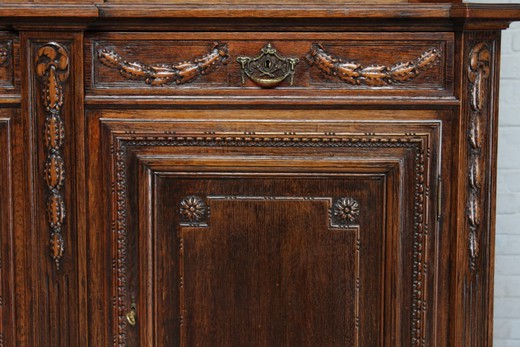 Antique Buffet in the style of Louis XVI. Made of oak. France, 1900s.