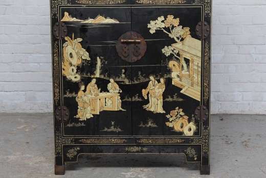 Antique cabinet in oriental style. It is made of wood. France, 1920's.