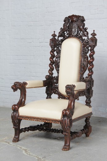 Antique armchairs in the Renaissance style. Made of oak. Upholstery - the skin. France, XIX century.