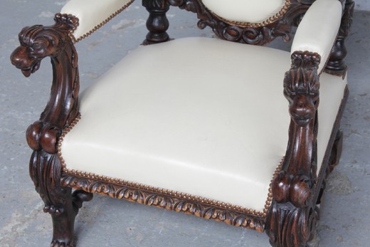 Antique armchairs in the Renaissance style. Made of oak. Upholstery - the skin. France, XIX century.