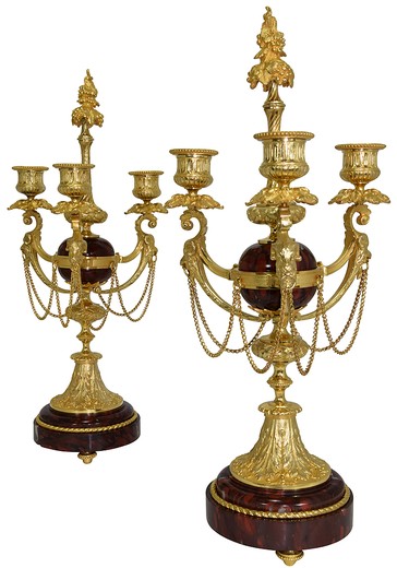 Antique paired candelabra