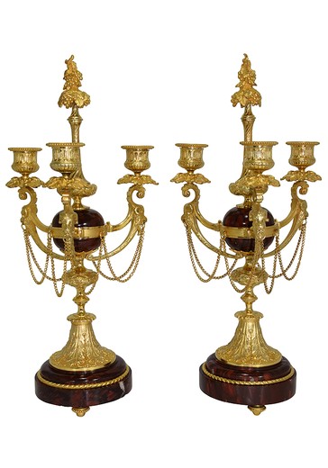 Antique paired candelabra