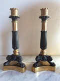 Antique paired candlesticks