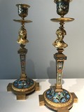 A pair of antique candlesticks