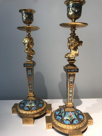 A pair of antique candlesticks