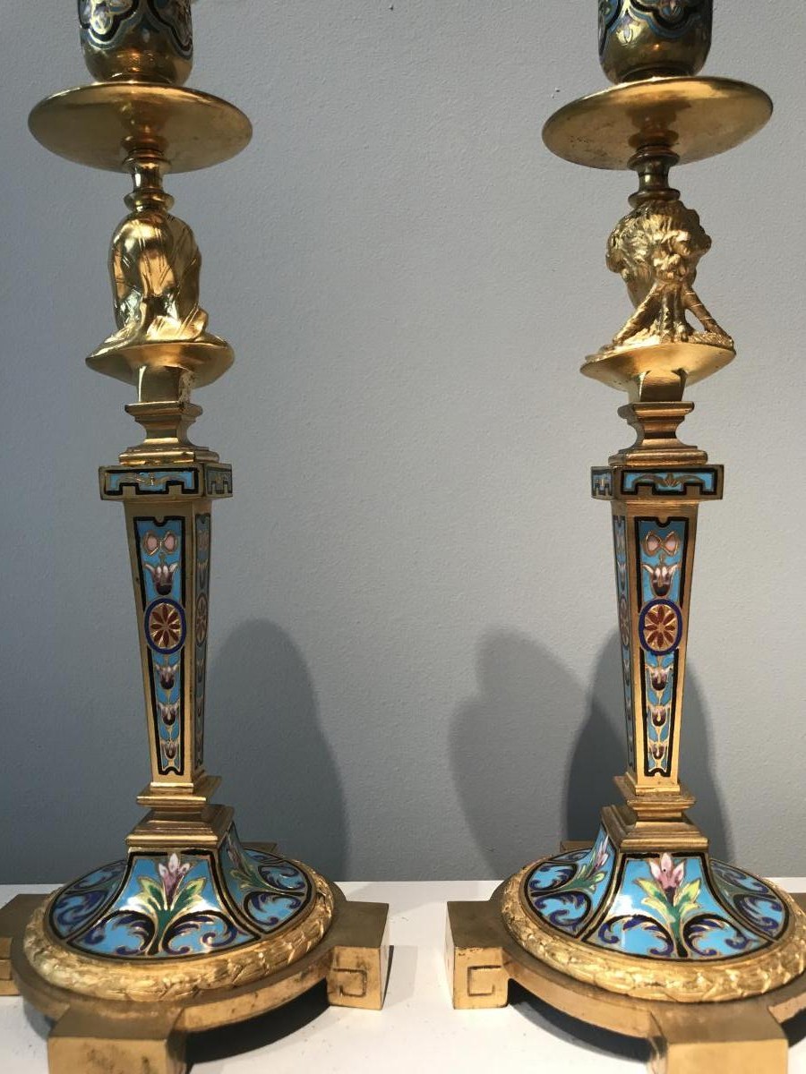 A pair of antique candlesticks