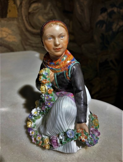 Antique statuette "Amager girl"