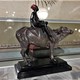 Antique sculpture "Boy on the Buffalo"