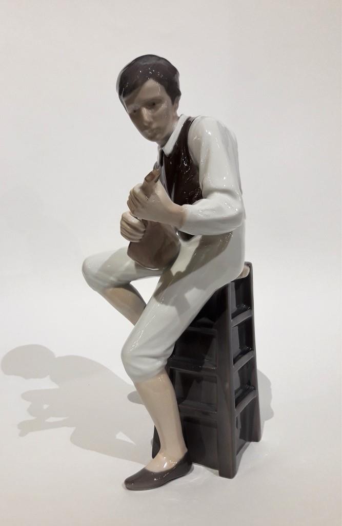Antique sculpture "Boy with a Mandolin"