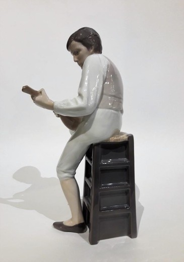 Antique sculpture "Boy with a Mandolin"