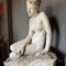 antique sculpture of a naked girl