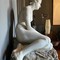 antique sculpture of a naked girl