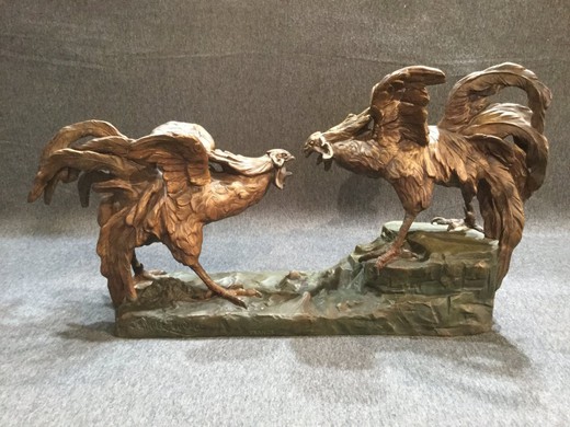 Antique sculpture of roosters' fight