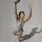 Antique sculpture of a volley ball player