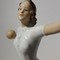Antique sculpture of a volley ball player