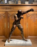 sculpture of a prize fighter