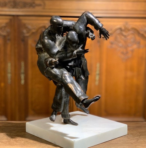 Antique judo sculpture