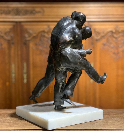 Antique judo sculpture