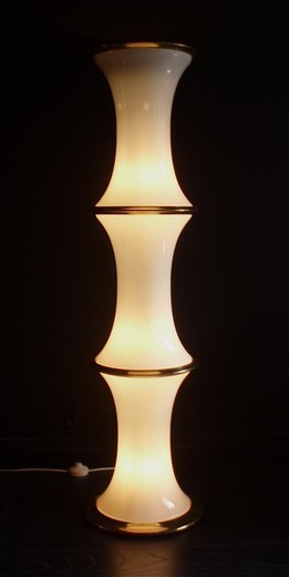 Vintage floor lamp. It is made of glass and brass. France, the 20th century.
